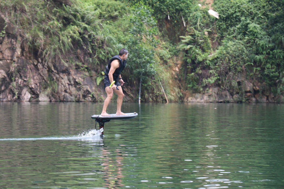 Foil Drive concept showing assisted hydrofoil board and rider in motion