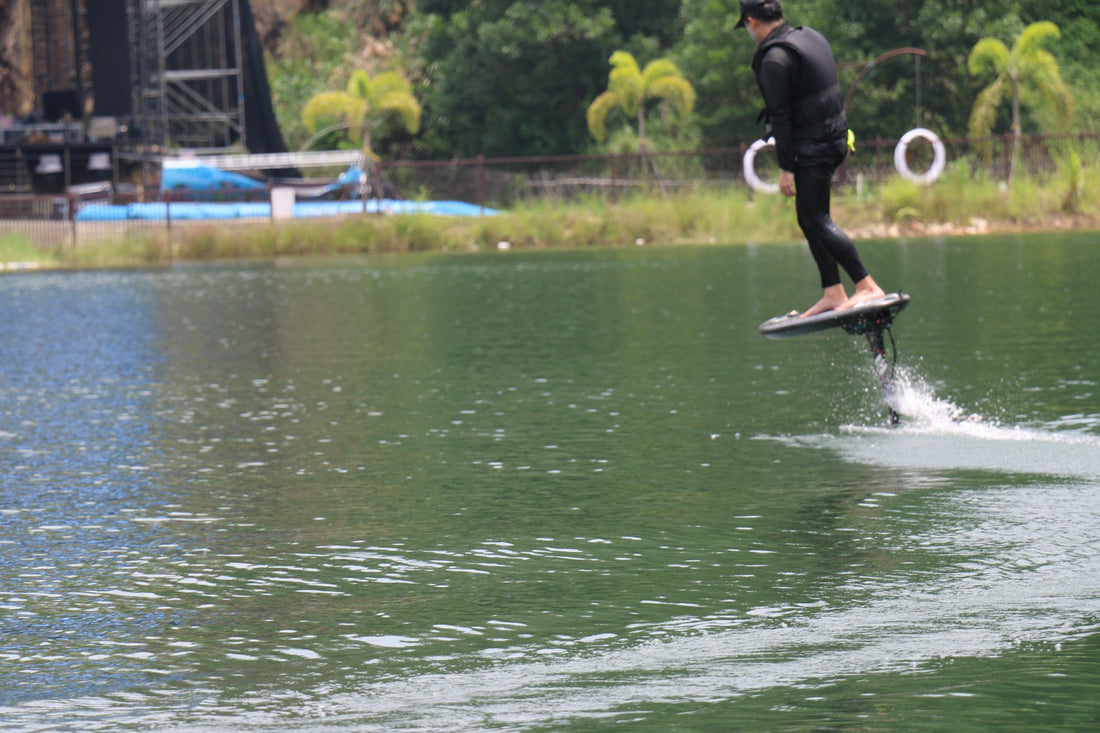 Foil Drive System electric-assist hydrofoil board lifting on water